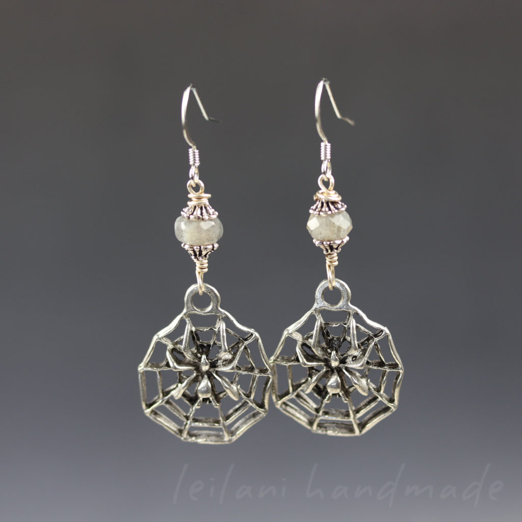 spider on web with labradorite earrings