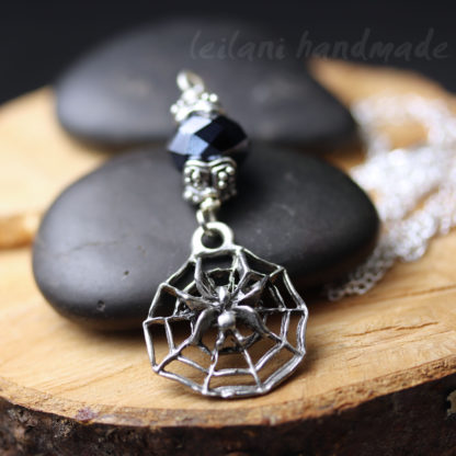 spider sitting on web pendant necklace