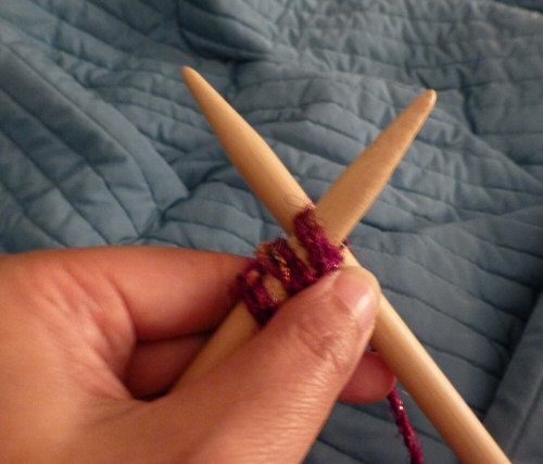 Insert left needle into the front of the knit stitch you just created, and essentially purl into this stitch