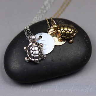 silver and gold turtle necklaces with engraved initial charm