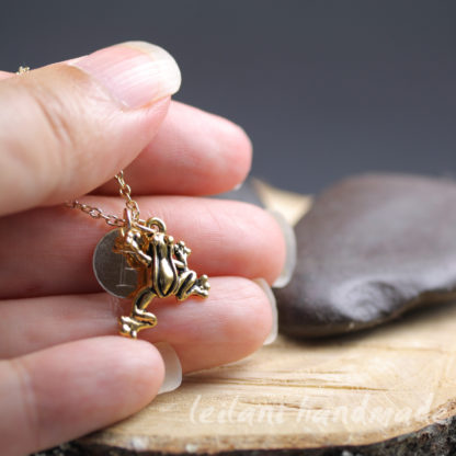 gold leaping frog charm necklace