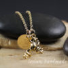 leaping frog necklace in gold with engraved letter charm
