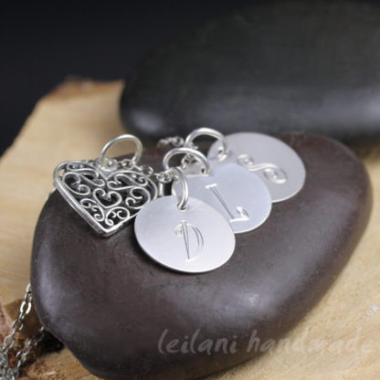 filigree heart charm with enhraved letter charms necklace