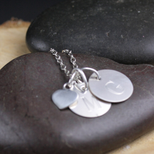 Cute sterling silver necklace with letter charms and tiny heart