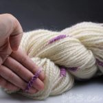 Handspun Yarn: White Coopsworth with Purple Stacks