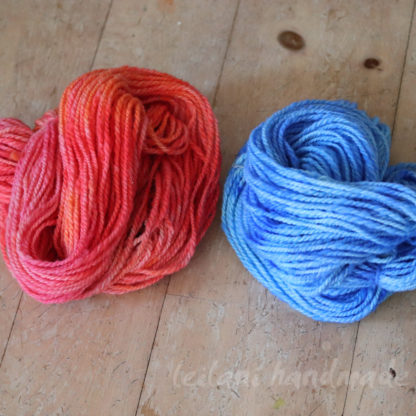 Handspun Corriedale yarn set kettle dyed hues of blue and soft coral