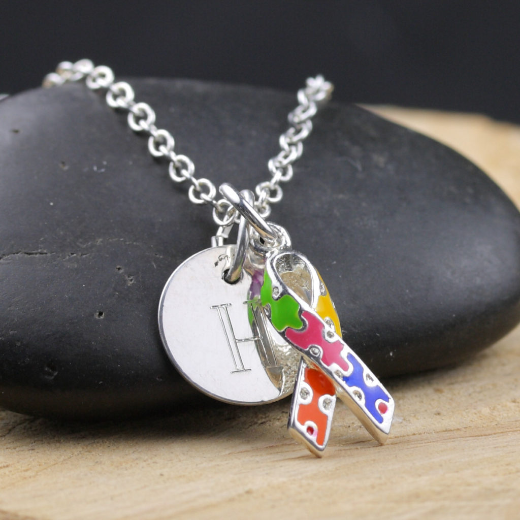 Enameled puzzle piece sterling silver necklace