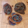 handspun yarn bundle rainbow with orange accent