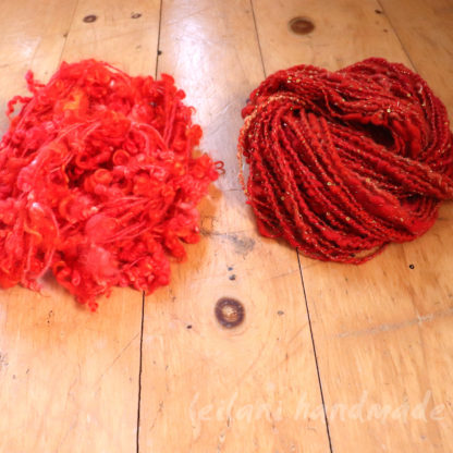 art yarn bundle orange and red