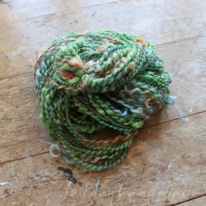 handspun art yarn spiral ply with mohair locks