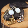 silver or gold auqmarine stone and om pendant