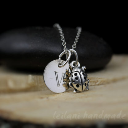 silver ladybug necklace with engraved letter charm