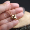 gold hummingbird necklace with engraved letter charm