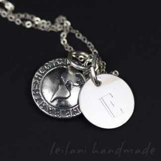 sterling silver charm necklace with a globe save the earth charm and an engraved disk with an E